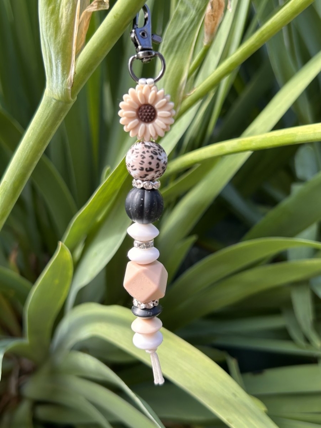 Porte clefs - Fleur beige-noir